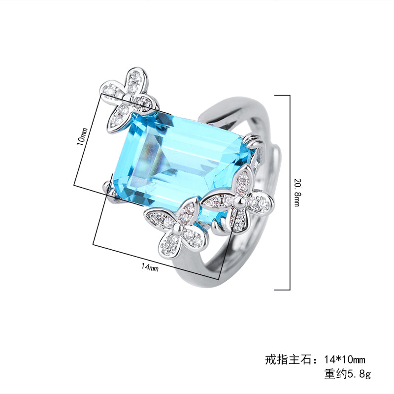 Title: Elegant Blue Topaz Ring with Floral Diamond Accents – Sterling Silver Adjustable Ring for Women