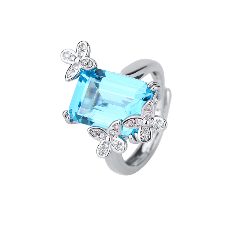 Title: Elegant Blue Topaz Ring with Floral Diamond Accents – Sterling Silver Adjustable Ring for Women