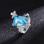 Elegant Blue Topaz Ring with Floral Diamond Accents – Sterling Silver Adjustable Ring for Women