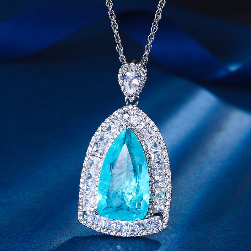 Multi-Color Teardrop Cubic Zirconia Statement Necklace – Silver-Tone Geometric Halo Design with Ruby, Sapphire, Emerald & Paraiba Hues